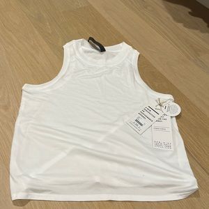 Vuori white workout tank. Size xs. New with tags